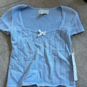 Light Blue Knit Top with Bow Detail